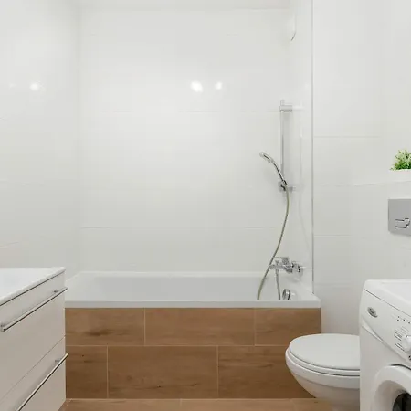 White And Beige In With Access To The Outdoor Gym By Renters Apartment